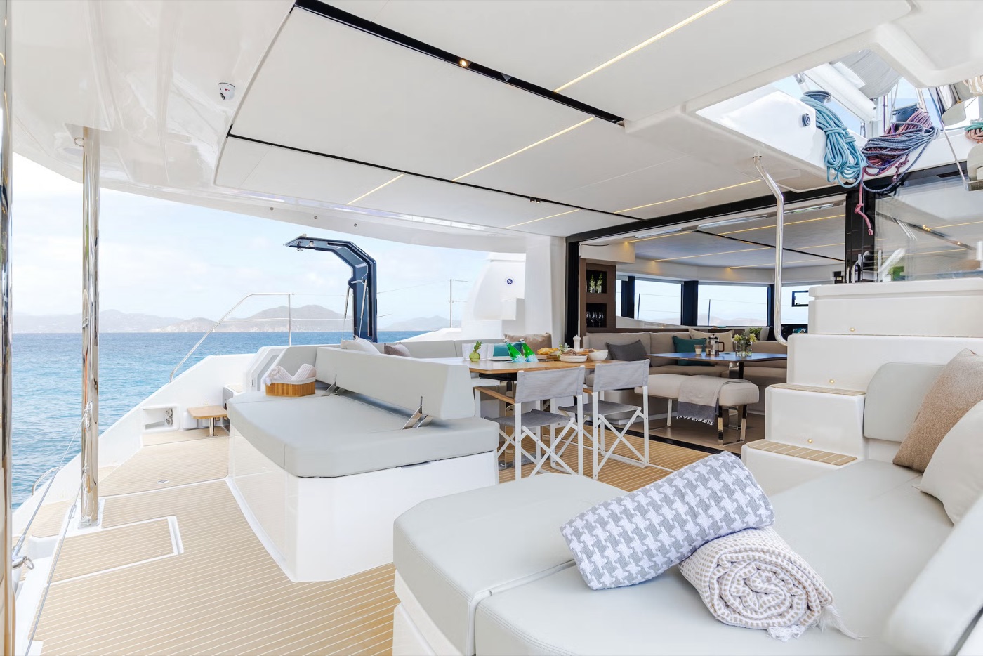 Leopard 52 — Aft-cockpit loungers and dining with sea views