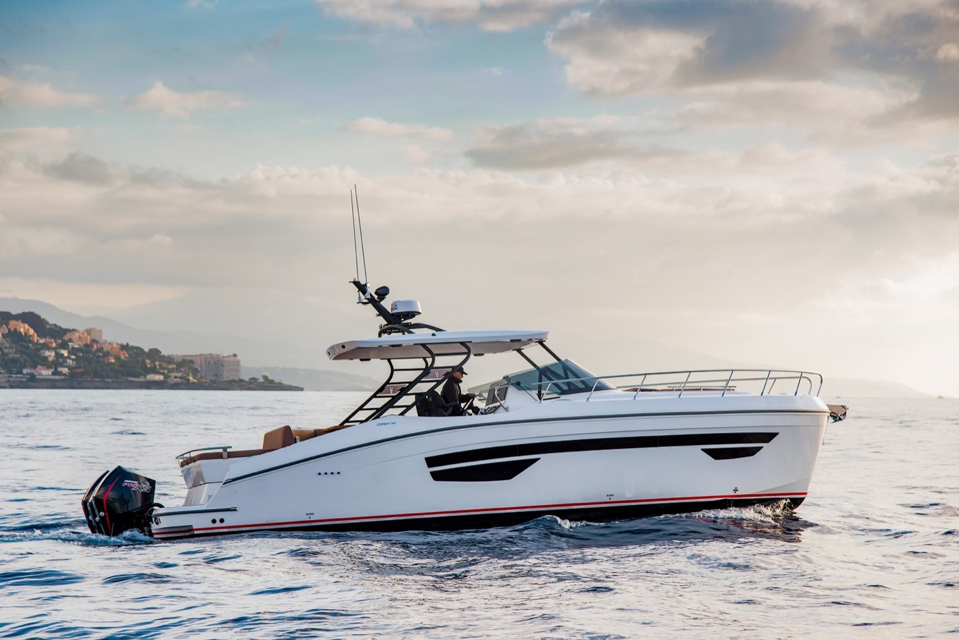 Oryx 379 profile cruising along the coast at dusk