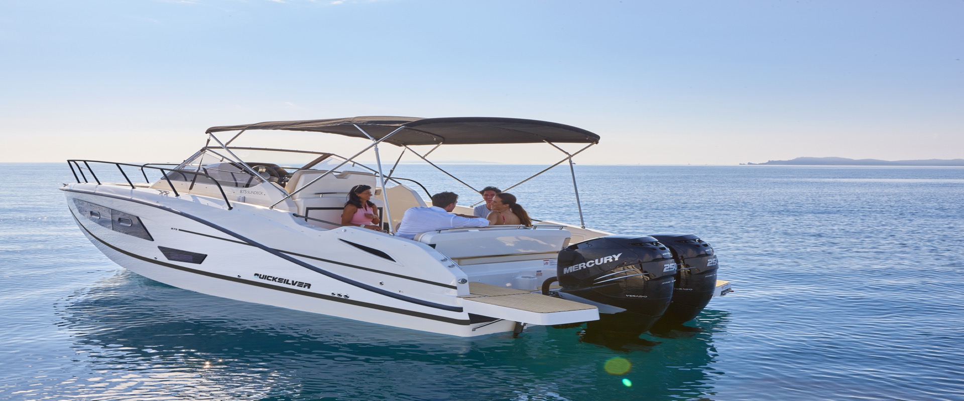 Quicksilver Activ 875 Sundeck cruising on clear open water