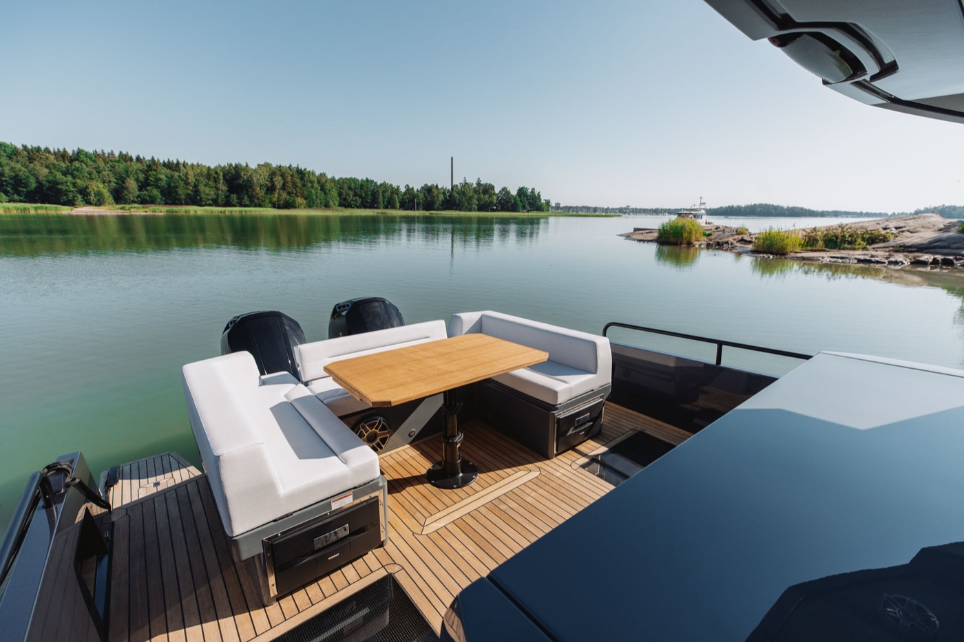 EXPLR 44 aft deck dining area in a Nordic archipelago bay